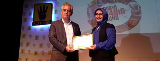 Rabia ödüllerinden biri de Başkan Aydın'a Rabia ödüllerinden biri de Başkan Aydın'a